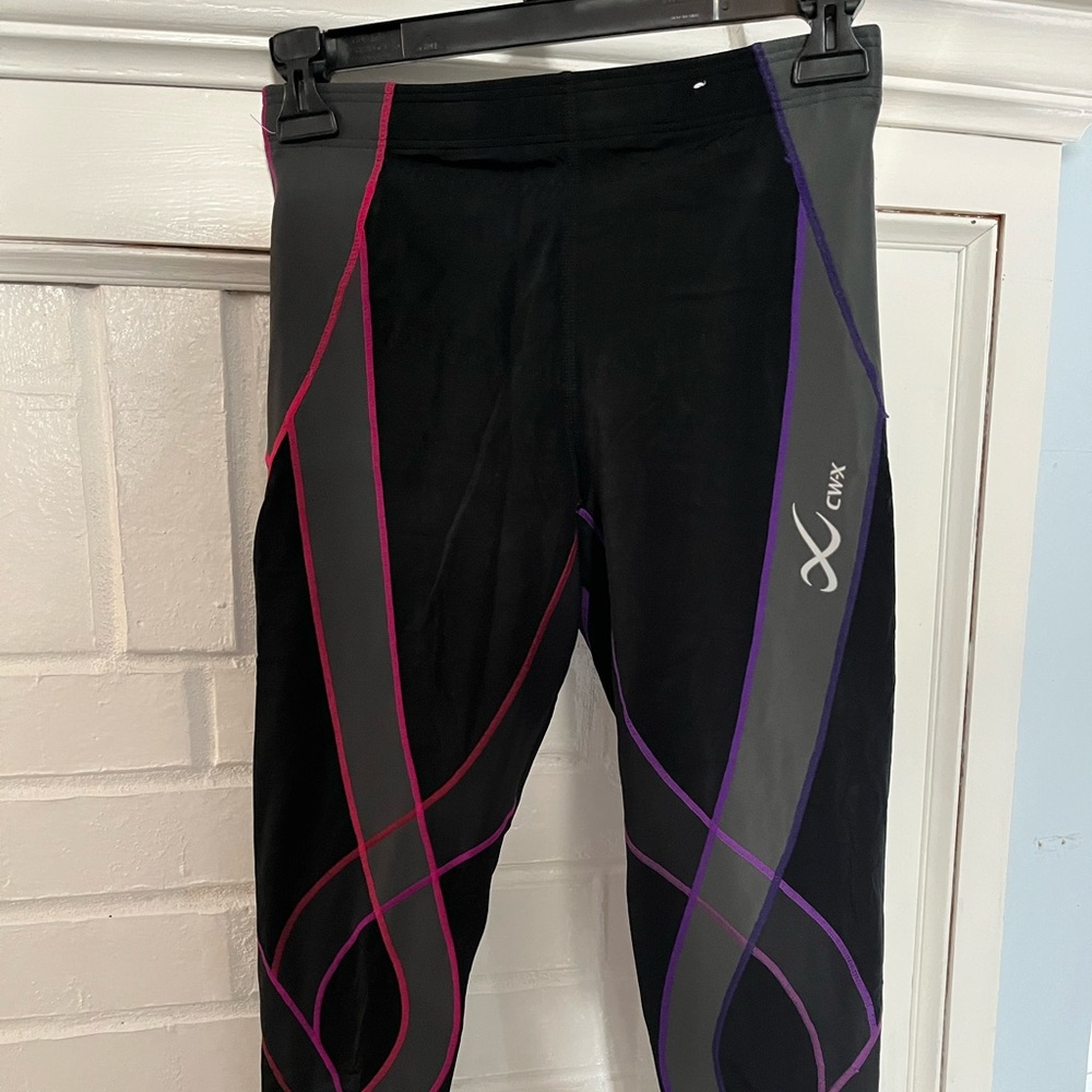 2 CWX compression leggings , NWOT Size M, Pink & Purple